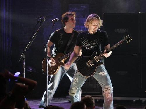 Chad Kroeger - Chad Kroeger playing guitar, from NIckelback.