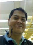 me - Me wearing the headset to my Motorola Razr V3X phone. I love this phone, too bad it's been discontinued. I wonder if the V3XX and the V6 are worth the cost of the upgrade...