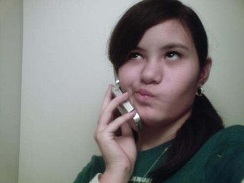 My daughter doing what she does best! - This is my daughter. She loves to talk on the phone!