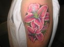 My latest addition of tattoos - I am always very careful of what I put on my body. I envisioned this tattoo and my tattoo artist drew it for me. This is a new tattoo and was inked on March 24th (just a few days ago). This picture was taken immediately after the tattoo was finished. Yes it hurt, and yes I love it.
