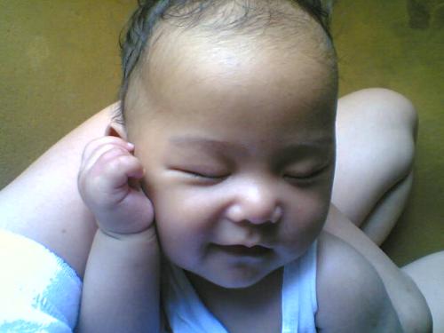 a baby's smile - a baby's smile is worth a thousand words..