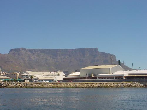 table mountain cape town - looks like a table and when the clouds go on it, looks like a table cloth