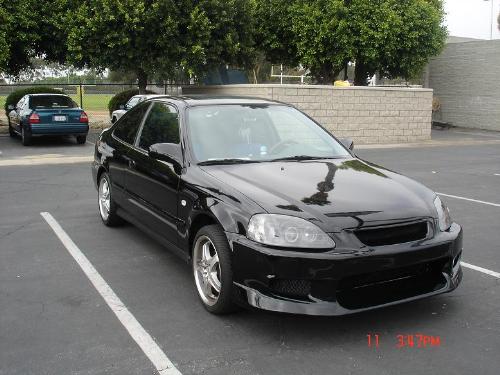My Batmobile - Here is my newly upgraded Honda Civic'Batmobile' It has a new front bumper, new rims, vinyl blue/black interior and a new stereo system. That's about it so far. Hopefully I can add more.