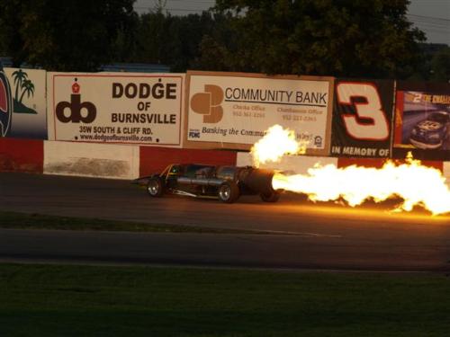Green Mamba - Green Mamba Jet Car performing at Raceway Park in Shakopee MN USA September 2006. It's burning a car with it's afterbeurners.