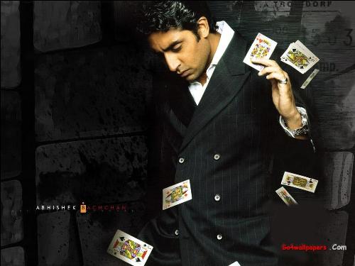 man with cards  - hey i love abhishek and playing cards both   bt in this pic both r together..