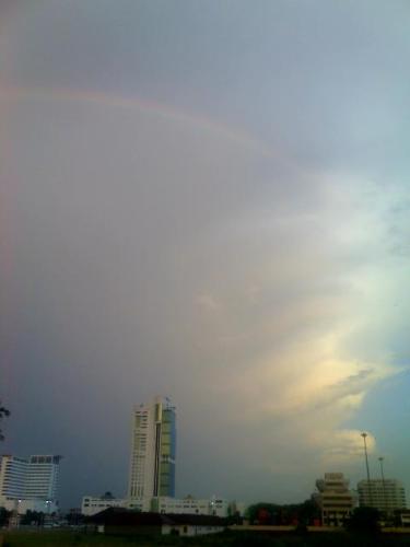 Sibu After the showers - Two different hues with a rainbow over it. Taken in Sibu town, Sarawak.
