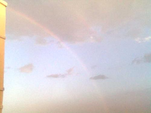 double rainbow - a rare sight of 2 rainbows playing accross.taken on mobile