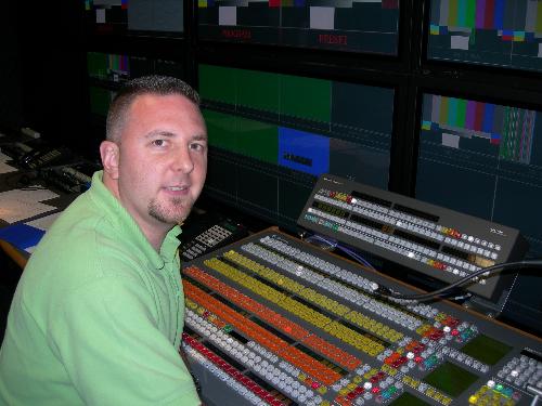 Matt at work! - This is a picture of me in Lyon Video's HD-6 production truck. It was taken in July 2006 in Lake Placid, NY at the annual Budweiser Grand Prix equestrian event. The show that I worked on was a dual HD/SD show for HDNet and OLN (now VS).  The switcher is a Grass Valley Kalypso.