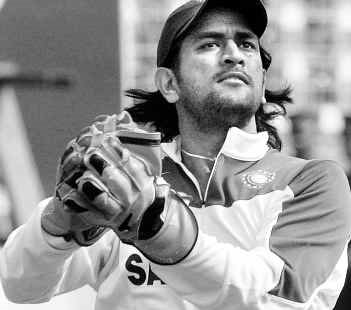 Keeping wickets - Dhoni keeping wickets with gloves. One of the safest hands.