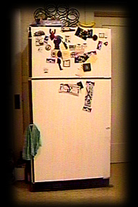 refrigerator - refrigerator with a couple of things on the door