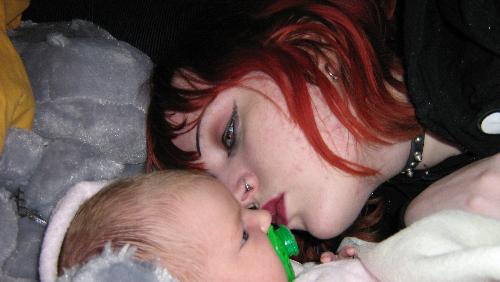 Love and Kisses - Me giving my daughter a kiss.