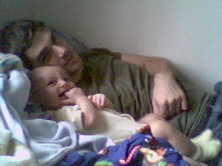 Tim & Jayden - Tim and Jayden laying down watching blues clues.
