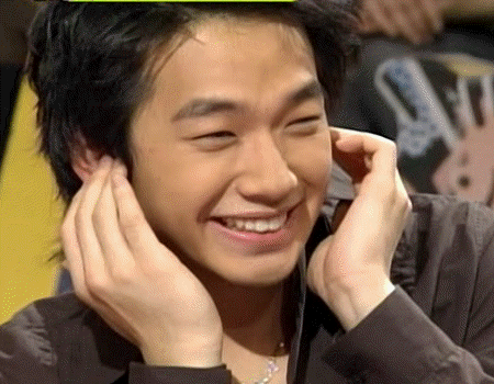 Rain touching his side burns - This is a picture of Rain touching his side burns. He does this when he is shy.