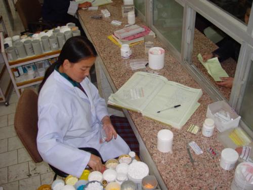 Medicine - Pharmacy technician sorting out the medicine