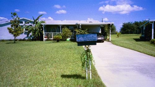 What do you like about your house - I love this house. I 'got' this house because I was in a auto accident in Florida, and with the money I received I could buy it. Here is a picture of it.