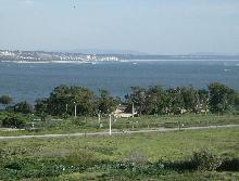 View From my Kitchen Window - View of the Tagus River Statuary in Lisbon, Portugal. View is of the southern bank of the river...Costa de Caparica. From there to the left is the entrance to the Atlantic Ocean west and to the south leading to Africa.