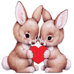 Bunnies  - Two cute bunnies holding a heart