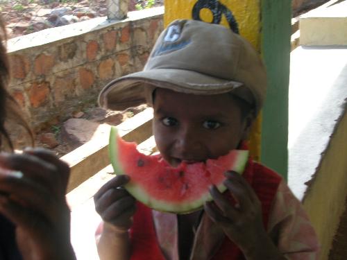 a boy is getting ready to face summer's heat.... - i took this photo on my way to tirupati in andhra.