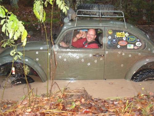 who likes to get dirty? - We have a lot of trails right a round our house , but i think this one is my favorite. We next to never get stuck in this thing, but we do on ocassion get water logged