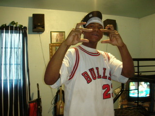 My handsom son - He is 15 years old and I am hoping that he soon realizes he is not gang related. I'm figuring he will grow out of it