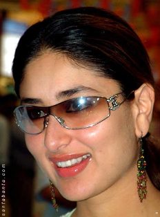 sunglasses - Kareens sunglasses . this big frame loos chic and happening on her .