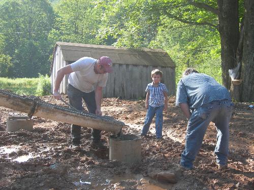 all of our friends pitched in to get our home up a - Last year we got our land ready for the trailer and got it up there. this year we have alot of mud and landscaping to deal with.  I love spring, the snow melting shows all of the new possibilities for the year.