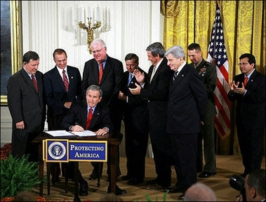 george bush - Bush signing some legal document or other