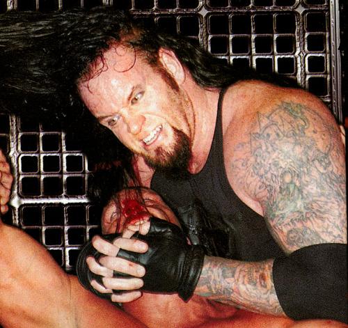 The Prince Of Darkness............. - The Phenom, Undertaker in action............