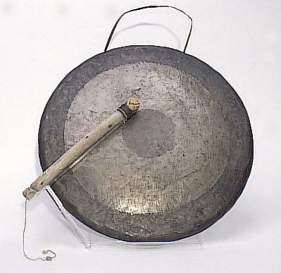 The gong - A picture of a gong and its stick.