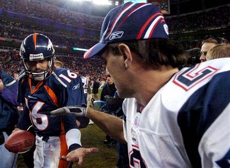 Broncos Beat Patriots - Denver Broncos win over the Patriots. Jake Plummer shakes hands.