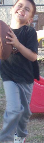 And he scores! - My 5 year old grandson in the backyard