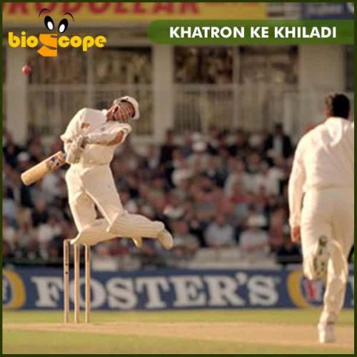Cricket - The photo shows a batsman jumping and saving his face from a bouncer.