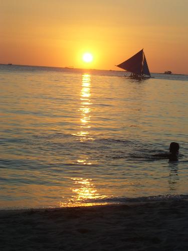 A heavenly feeling... - Enjoying the water while watching the sun sets in boracay. A heavenly feeling... - Enjoying the water while watching the sun sets in boracay.
