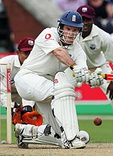 batsman - a cricketer in action