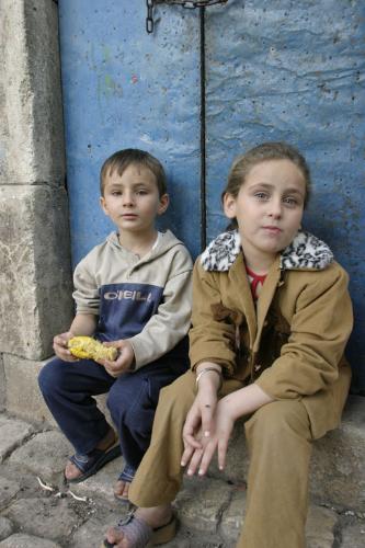 brother and sister - brother and sister waiting for someone, possibly their parents?
