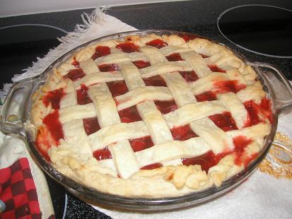 Cherry Pie with Latice Crust - 'Can she bake a cherry pie, Billy Boy' Love a cherry pie, with a touch of almond extract (pure) in the cherry sauce, or soup as we call it. A big dollop of whipped cream or french vanilla ice cream completes the picture.