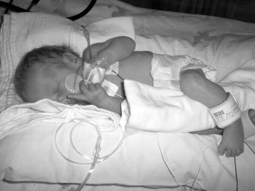 First day of life as a preemie - 4 pounds 7 ounces  17' long and perfect!