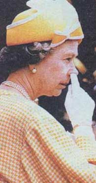 Queen of Nose Picking - The queen of England picks her nose.