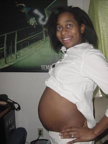 Pregnancy - Family out of town wanted me to post pic on my myspace so they could see that I really was pregnant...AGAIN. With yet another precious girl. Due May 15,07. I was about 26 weeks in this photo..
