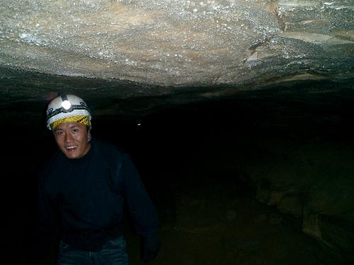 caving - this is a picture taken underground in mammoth cave Kentucky. the guy in the pic is part of our tour group. no one knew his name so we called him taiwan because that's where he was apparently from.