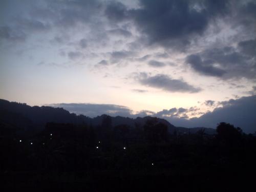 puncak megamendung - bukit hijau on sunset