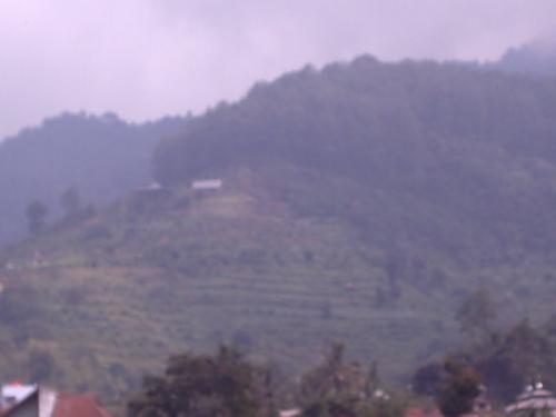 megamendung puncak - panoramic megamendung puncak view with thin clouds
