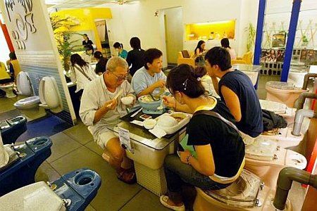 Will you eat in the 'toilet' ? - This is a picture of a restaurant with a 'toilet' environment. Something unique. Will you eat here? Will you eat in the 'toilet' ? - This is a picture of a restaurant with a 'toilet' environment. Something unique. Will you eat here?