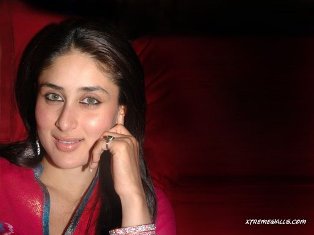 bebo - A quite nice image captured when she was just looking at you . She is quite and calm here and unfazed with a sweet little smile .
