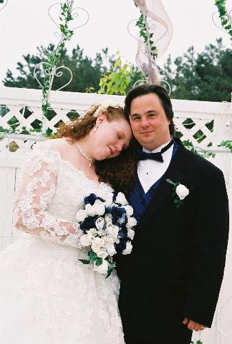 Favorite wedding photo - My favorite picture from my wedding day. This was caught in one of those moments where I thought we were between photos and I just rested my head on his shoulder and sort of hugged him. I'm so glad it was captured!