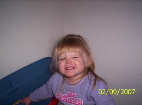 Smile - This is the face she makes when you tell her to smile.