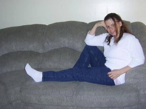 me - me sitting on the couch. taken febuary 2007