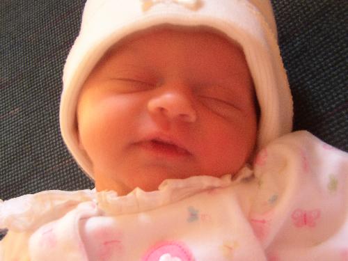 grandchild - This is my first granddaughter Gabriella Kay! This was taken on her 1 week birthday at my house. She only weighed 5 lbs. 7 1/2 ounces. She is growing though.