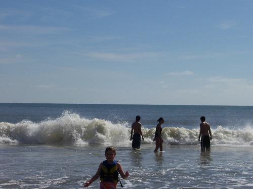 beach pictures - My favorite thing to do. Go to the beach and watch the kids play in the ocean.