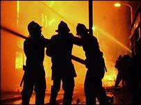 Firemen - A picture of firemen sparying down an enormous fire! you rock guys!